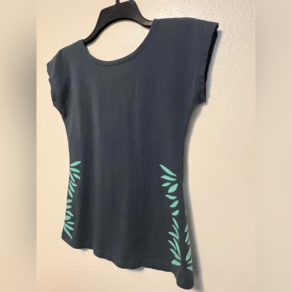 Synergy Organic Clothing | Blue Top with Open Back and Light Blue Leaf Applique